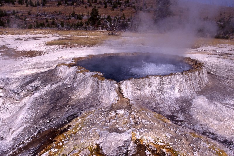 Beautiful Punch Bowl Spring is named for the large geyserite rim that gives the appearance of a punch bowl. Photo courtesy of the National Park Service.