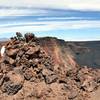 The Summit Cairn on Mauna Loa. An outline of distant Mauna Kea on the left horizon. with permission from Andrew Stehlik