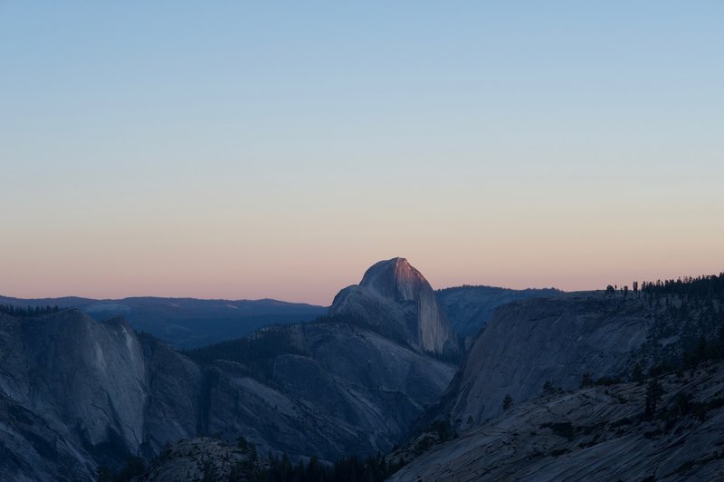 Quarter Domes and Half Dome at Sunset.   Olmsted Point is a great place to view the rock features of Tenaya Canyon and watch the sunset.
