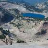 Looking down at the parking lot and Lake Helen as you climb up Lassen Peak.