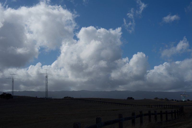 Antennas line the ridge here and the Stanford Dish is seen off in the distance on the right-hand side. Walkers and runners are asked to stay on the trail and not wander in the fields, which are in the process of being restored.