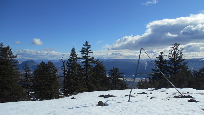 Looking southeastish from Mara Hill (1050m) toward Kamloops (obscured by trees, center frame) and Mount Peter (1097m; horizon, left).