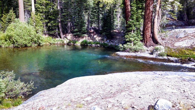 Crystal clear pool showing off the rainbow colors of the San Joaquin River.