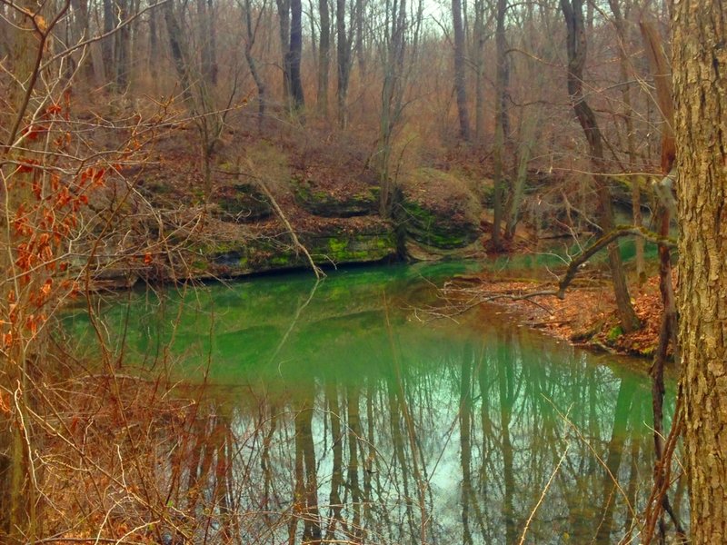 An eerily calm shot of the Hidden River from the foot bridge.