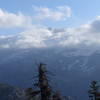 Watching the clouds settle over the peak from the Stevenson Trail.