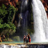 Visitors posing in front of Havasupai Falls.