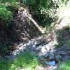 The dry creek bed that the trail crosses.