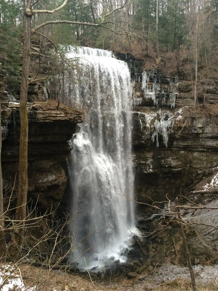 An icy Virgin Falls in mid February. Follow the Virgin Falls Loop Trail in the Virgin Falls State Natural Area, passing three other marvelous waterfalls before reaching the 110 foot waterfall.