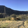 The cattle tank and windmill at the end of the Wild Burro Trail.