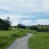 The trail climbs from the Juan Bautista de Anza Trail toward the Portola Pastures Trail.