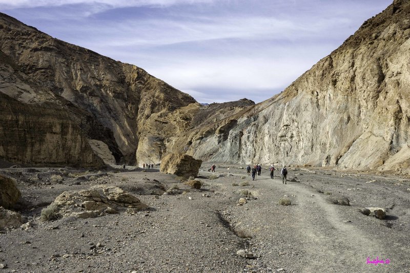 Visitors work their way through the canyon.