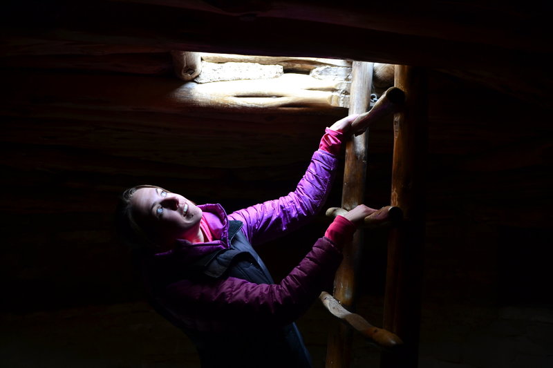 Kmeg climbing out of one of the kivas. Love the immersive experience of the Spruce Tree House tour.