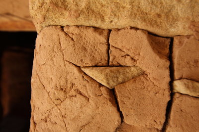 Many of the walls in the back of the alcove are original. Look for corn cob impressions and even fingerprints! (But remember, don't touch!!)