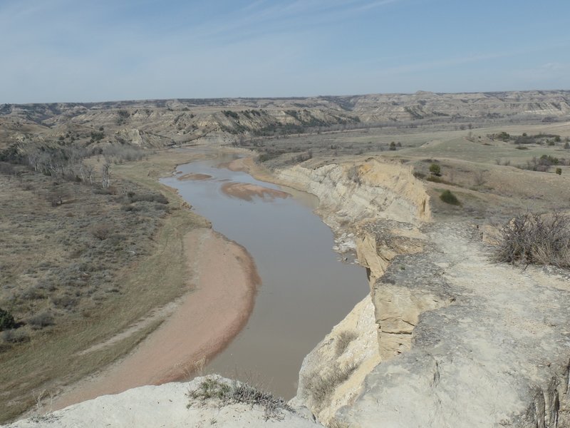 View of the Little Missouri River flowing north through the South Unit of the Theodore Roosevelt National Park.