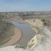 View of the Little Missouri River flowing north through the South Unit of the Theodore Roosevelt National Park.