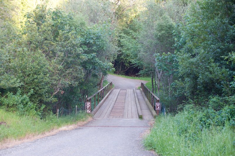 The bridge that leads to the trail from Alpine Road.