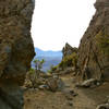 Walking between "Split Rocks" volcano rocks.