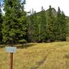 Trailhead for the Pebble Creek Connecter Trail, the best place to begin or end your Pebble Creek trek. This is right on the highway just north of the Pebble Creek Campground.