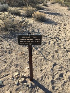 Sign at trail intersection marking the dry wash that is part of the Encinas Trail leading to Ez-Kim-In-Zin Picnic area.