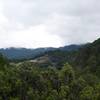 A view of the surrounding hills as low hanging clouds hug the hilltops.