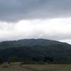 The trail as it makes its way along the hilltop and the surrounding hills.