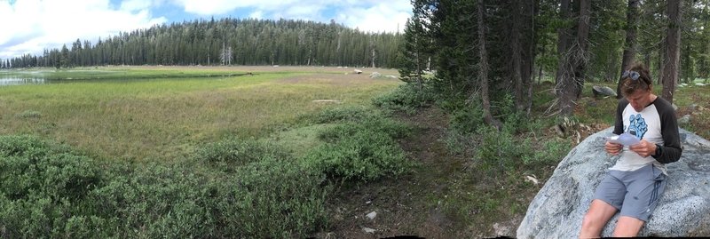 Checking the trail map near Crescent Lake.