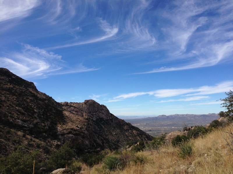 On Romero Canyon trail looking west at Oro Valley, Rancho Vistoso, and Tortolita Mountains.