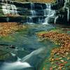 Waterfall leading down the canyon.