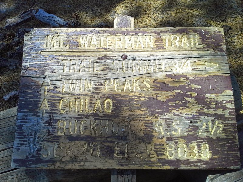 Sometimes the sign is standing, and sometimes it is laying down. By the way, it is Waterman Mountain, not Mt. Waterman.