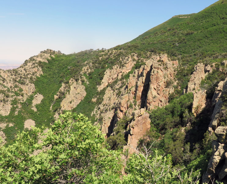 The trail skims along the top of those rocky crags.