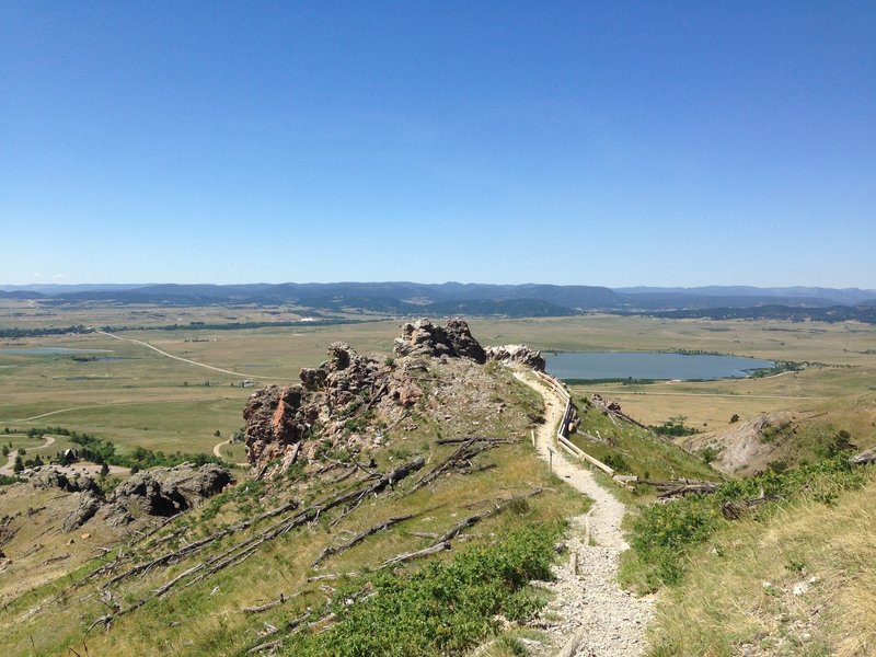 Huge skies, expansive prairie views, and evidence of the 1996 fire are constants on this trail.