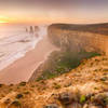 The Twelve Apostles shrouded by ocean spray.