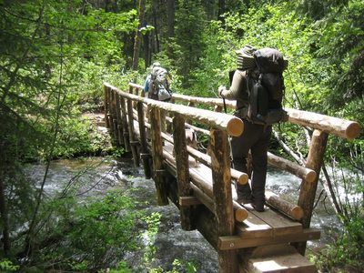 Hikers crossing the Salmon River on Jackpot Meadows Trail.  Photo by Daniel Sanderman