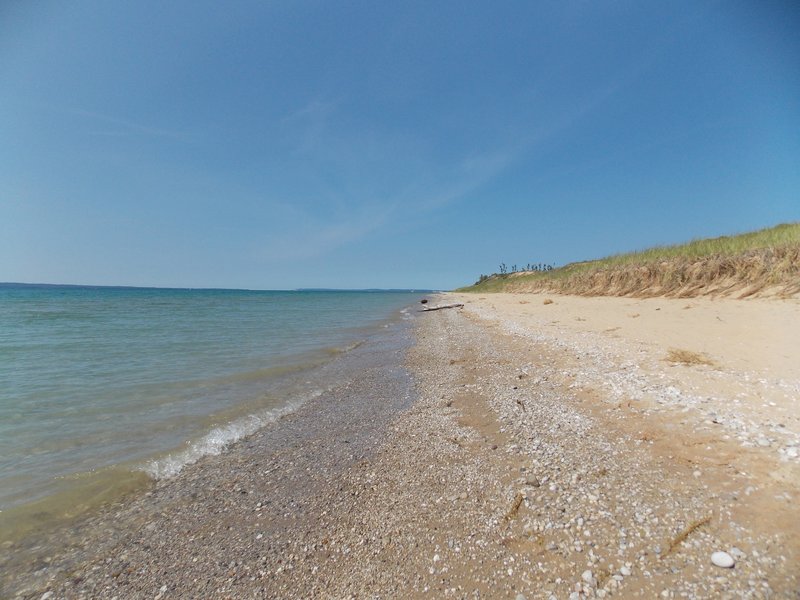 The beach at the end of the trail is sandy and seemingly endless. Very easy to get your own private section.