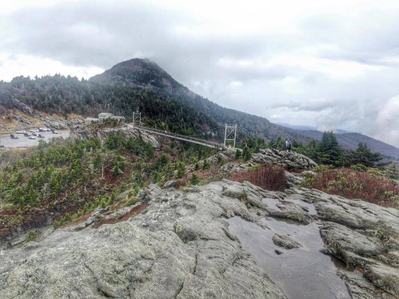 This is MacRae Peak which stands at 5844 feet. in North Carolina. The bridge is exactly one mile above sea level.