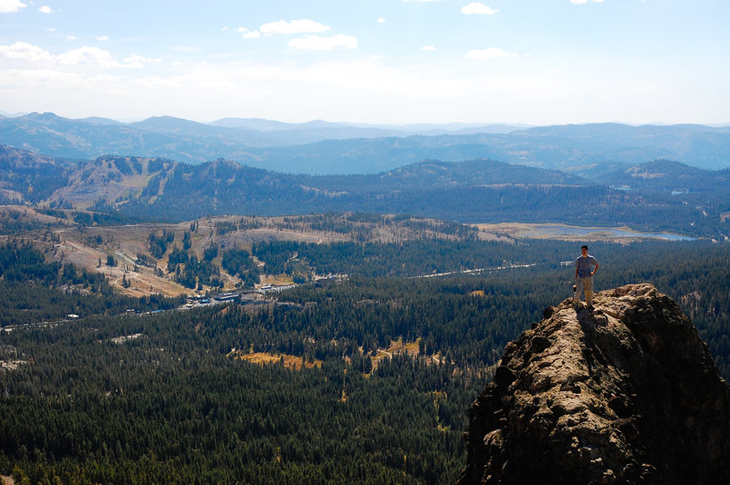 Numerous volcanic ranges ripple away from the southern aspect of Castle Peak.