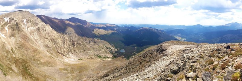 On top of Mt Chiquita looking toward Ypsilon on the left, Lake Ypsilon center, and Estes Park in the distance.