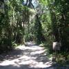 The Nature Trail begins along a sandy route.