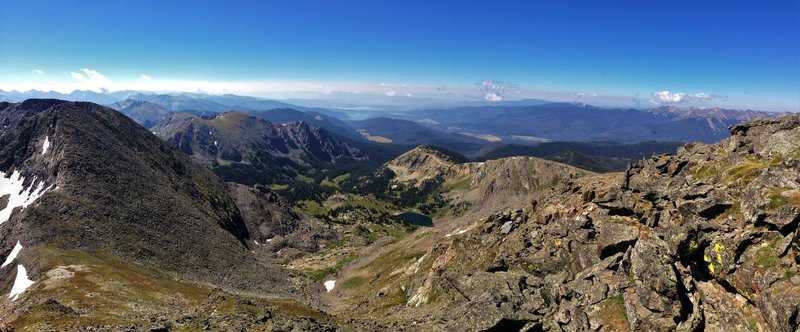 On top of Mt Ida looking southwest you see several valleys as well as Grand Lake and Shadow Mountain Lake in the distance