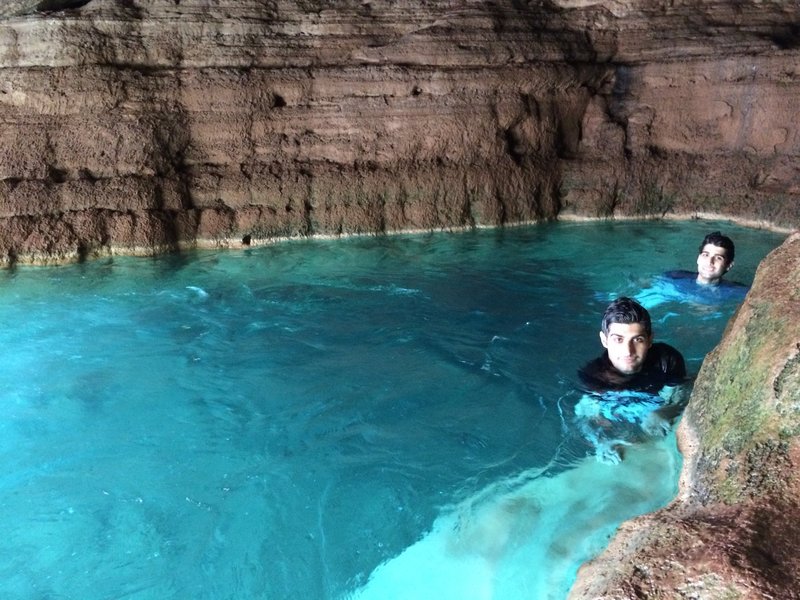 Small cave near the toilet bowl. Bring goggles to view the floor of the cave + the fish.