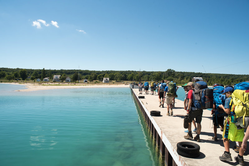 Walking from the Manitou Island Transit ferry onto North Manitou Island.