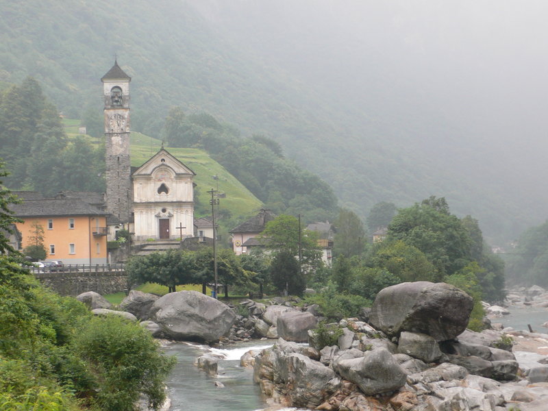 Admiring the view of the village on a rainy day.