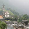 Admiring the view of the village on a rainy day.