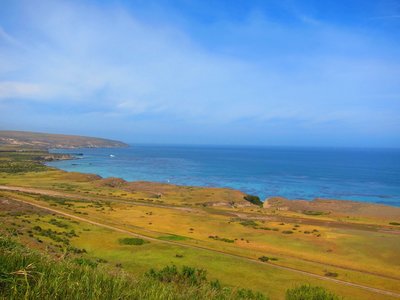 Santa Rosa Isl: Bechers Bay from Cherry Canyon Tr. Airstrip and Coastal Road in foreground. Pier mid left, across from boat.