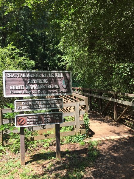 This is the sign and bridge which starts you off from the parking lot.