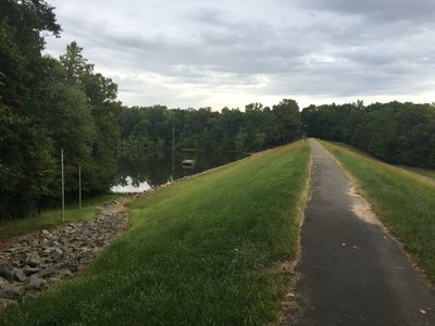 Trail crossing Mercer Lake Dam at eastern edge of lake.