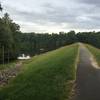 Trail crossing Mercer Lake Dam at eastern edge of lake.