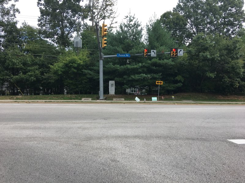 Intersection of Southrun Road and Pohick Road. Cross over to east side of Pohick Road. NOTE: No Cross Walk!