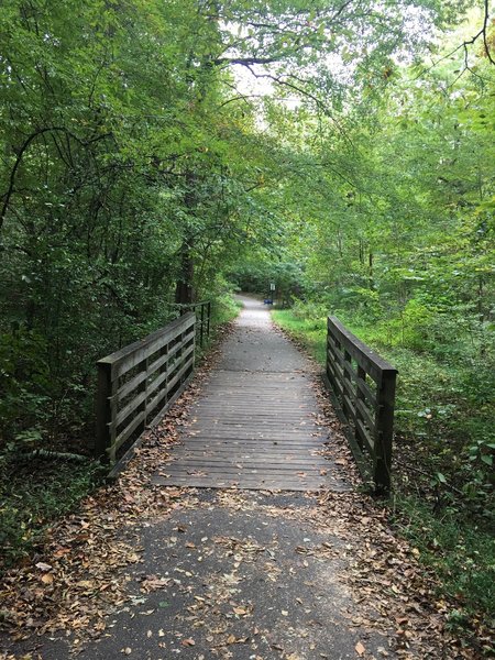 Bridge over tributary flowing into South Run stream.