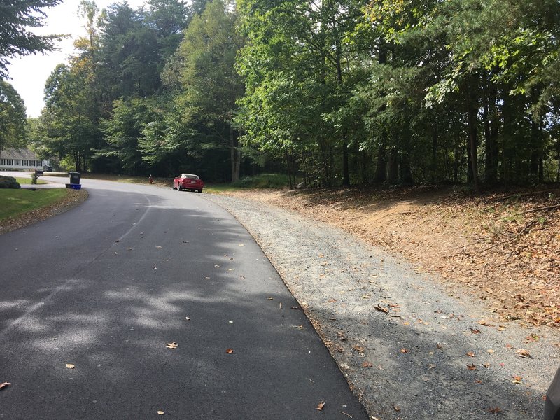 Street shoulder parking near beginning of South Run Stream Valley Trail and Burke Lake Trail.